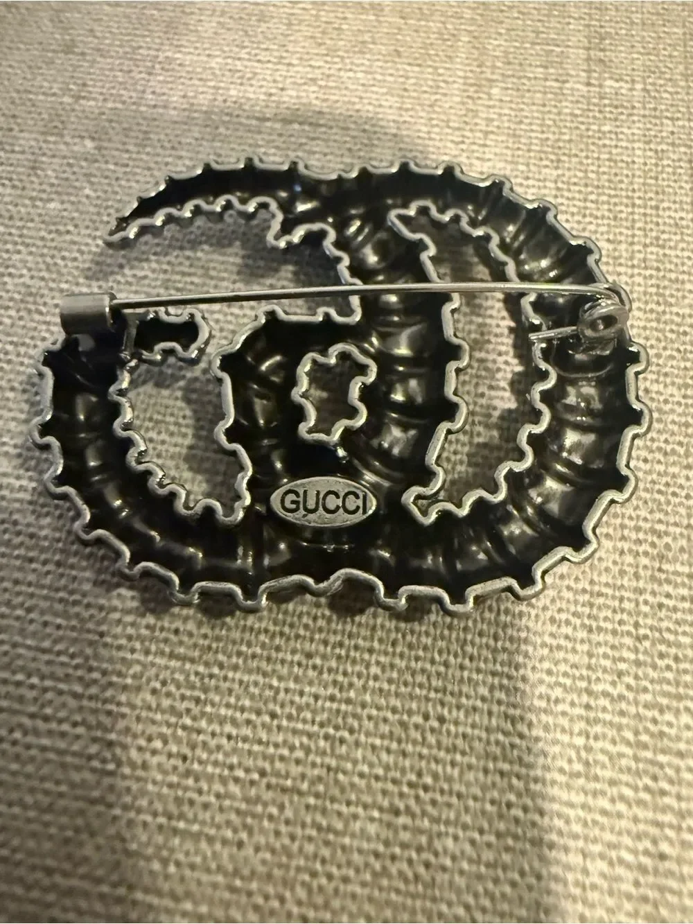 New with box Gucci gun metal color gg brooch